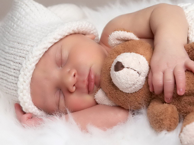 sleeping-baby-with-animal